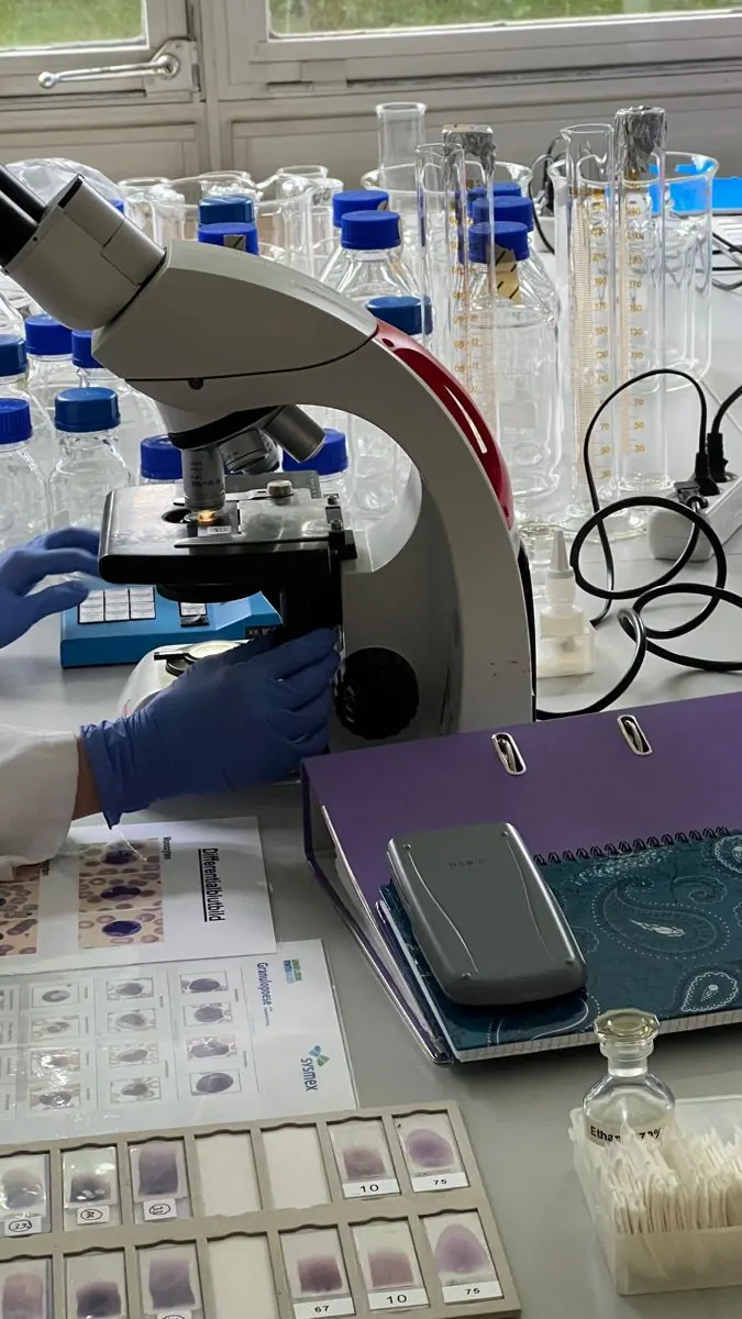 Pathology laboratory microscope and sample setup used for MLT training at L.N. Paramedical Institute, Borivali