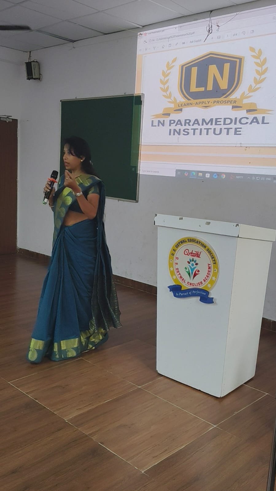 Speaker addressing students during a seminar